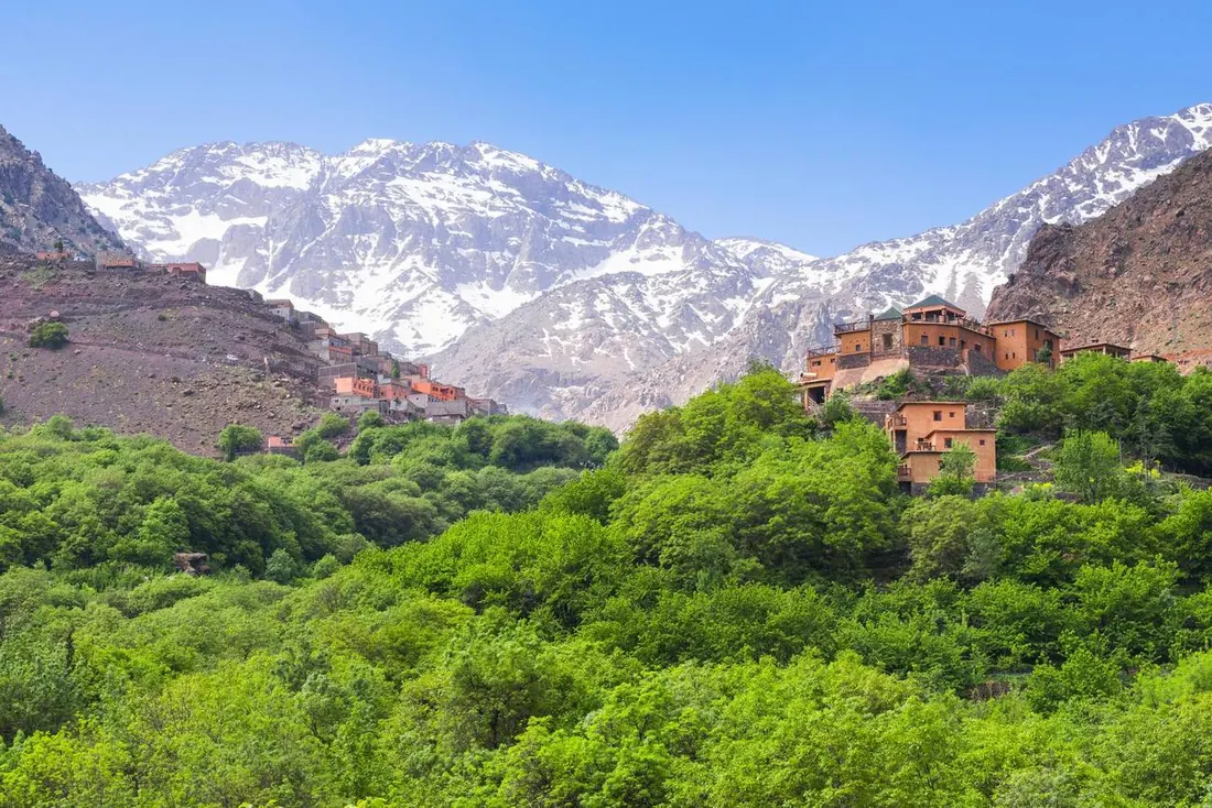 A Berber village below the snow-capped High Atlas
